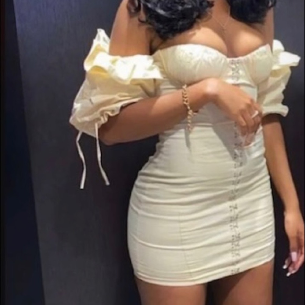 PUFF SLEEVE CORSET MINI DRESS IN IVORY